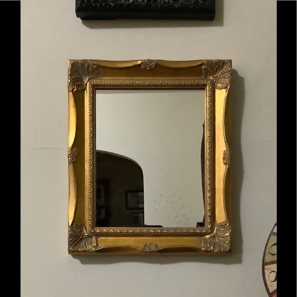 Ornate Gold Wall Mirror with Decorative Frame